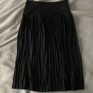 Black high-waisted pleated midi skirt